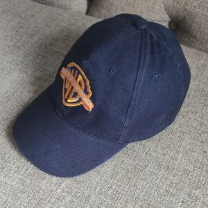 Warner Brothers Unisex Navy Blue Baseball Cap with Gold Emblem Adjustable Strap
